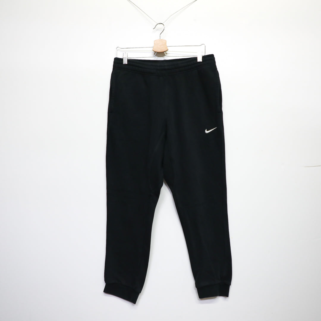 Nike tracksuit bottoms mens black online